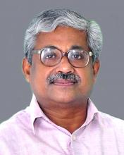 Dr. Varughese George
